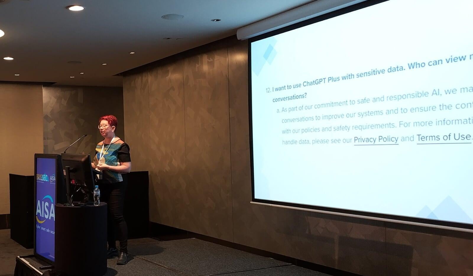 Kristine presenting at BrisSEC 2023